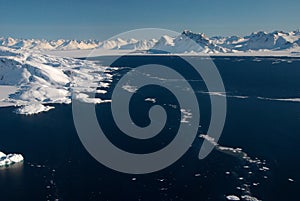 Greenland, ice floe and mountains