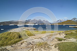 Greenland - landscape with Fjord, Mountains, Icebergs