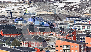 Greenlandic colorful houses standing on the rocky hills, Nuuk ci