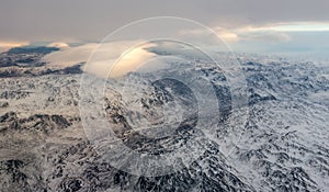 Greenlandic ice cap with frozen mountains and ridges aerial view, near Nuuk, Greenland