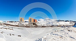 Greenlandic landscape with Inuit multistory houses of Nuuk city on the rocks, Greenland