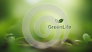 Green Life Logo with Leaf Symbol on Soft Focus Green Background greenlife