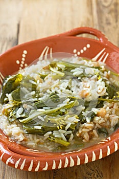 Greens with farinheira and rice photo