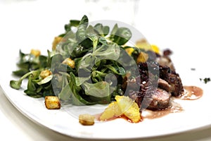 Greens with grilled meat
