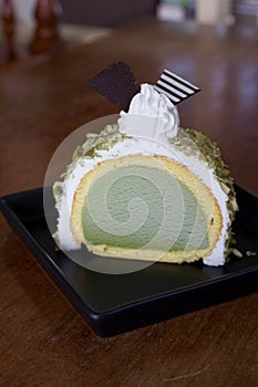 Greentea icecream cake on wood table