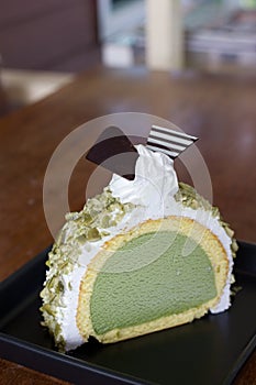 Greentea icecream cake on wood table