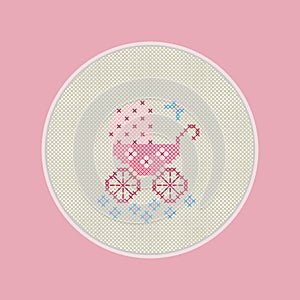 Greeting card with the birth of a child. There is embroidered baby carriage in a pink color in the picture