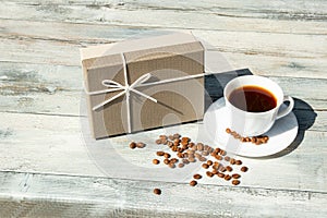 Greeting card. Birthday giftbox with white cup of black coffee w