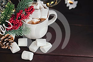 Greeting card. Christmas drink hot chocolate with marshmallows at festive decoration. Copy spase