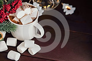 Greeting card. Christmas drink hot chocolate with marshmallows at festive decoration. Copy spase