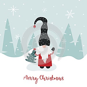 Greeting card with cute Scandinavian gnome, snowflakes and greeting text Merry Christmas. photo