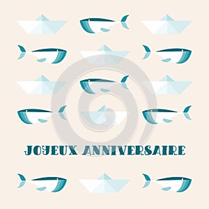 Greeting Card. Cute Whales and Paper Ships. Text Happy Birthday in French: Joyeux Anniversaire