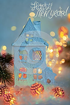 Greeting card Happy Merry Christmas. Beautiful blurred blue background of winter decoration for the holiday.