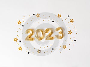 Greeting card - happy new year with numbers 2023 and gold and black glitter on white background