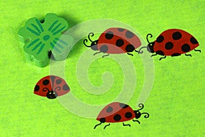 Greeting card with ladybirds and cloverleaf