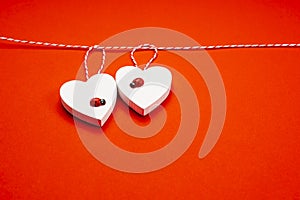 Greeting card. Love concept.Two white hearts on a red background.Template on the theme of valentine's day, romantic