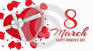 Greeting card for 8 March. Red gift box of heart on happy womens day. Light white background. Rose petals and confetti. Banner on