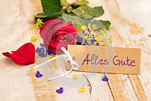 Greeting card for Mothers Day or Valentines Day with card and german text, Alles Gute, means all the best