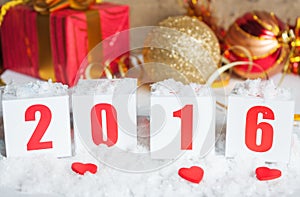 Greeting card with New Year gifts and snow