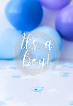 Greeting card postcard It is a boy text on Abstract defocused blurred festive background for holiday. Blue ballons and