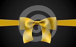 Greeting card with realistic golden bow on a black background