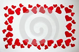 Greeting card with red hearts on a white background. Valentine`s day holiday concept. Flat lay, copy space