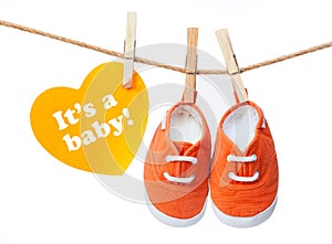 Greeting card 'it's a baby' baby's sneakers