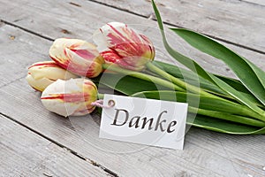 Greeting card with tulips and german text: Thank you