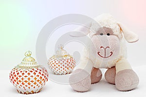 Greeting card on white background. Eid Al Adha sacrifice festival, Islamic Arabic candle and sheep