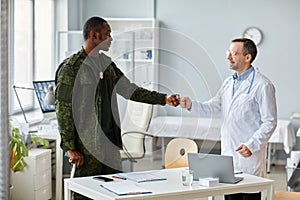 Greeting Doctor With Fist Bump