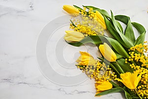 Greeting for International Women's Day on March 8th. Branches of mimosa and tulips