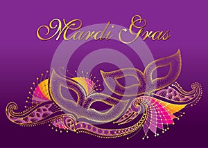 Greeting poster with two dotted carnival mask and outline decorative lace in gold on the violet background. Celebration design. photo