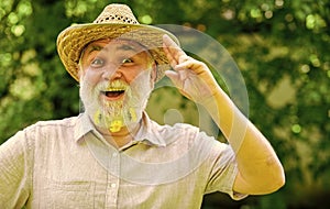 Greeting summer. happy man welcome saluting. senior man wear summer straw hat. good memories of past. Human emotions and