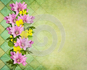 Greetingcard with mallows an violets in a garland against a textured background