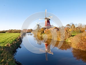 Greetsiel, traditional Dutch Windmill photo