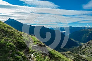 Greilkopf - Lush green alpine meadow with panoramic view of majestic mountain peaks of High Tauern National Park