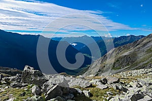 Greilkopf - Lush green alpine meadow with panoramic view of majestic mountain peaks of High Tauern National Park