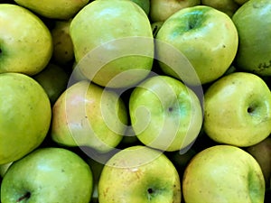 Grenny Smith apple, apples, sweet, sour, tasty and juicy delicious yellow, green colored fruit, fresh, raw, and ripe, food