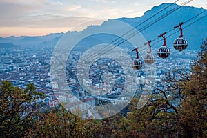 Grenoble and cable cars at dusk