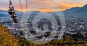 Grenoble and cable cars in the sunset