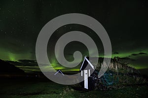 GRETTISLAUG Campsite on Iceland, northern lights