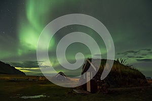 GRETTISLAUG Campsite on Iceland, northern lights