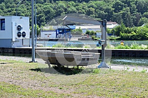 Grevenmacher, Luxembourg - 07 11 2023: Boat on a crane at the sluice