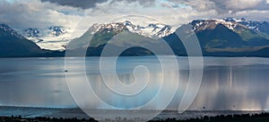 Grewingk Glacier and Kachemak Bay under clouds photo