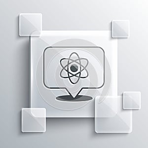 Grey Atom icon isolated on grey background. Symbol of science, education, nuclear physics, scientific research. Square