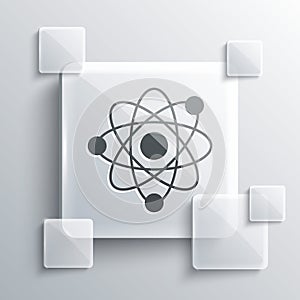 Grey Atom icon isolated on grey background. Symbol of science, education, nuclear physics, scientific research. Square