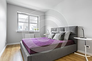 Grey bedroom with double bed