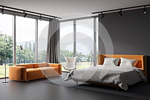 Grey bedroom interior with bed and couch near panoramic window