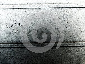 Grey and black grunge wall textured background.