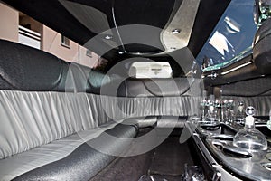 A grey and black interior limo car